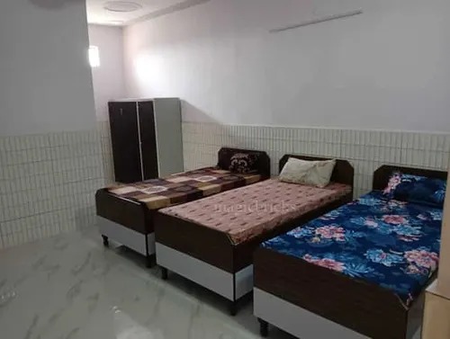 Shared room with beds - JayDhaneshwar PG